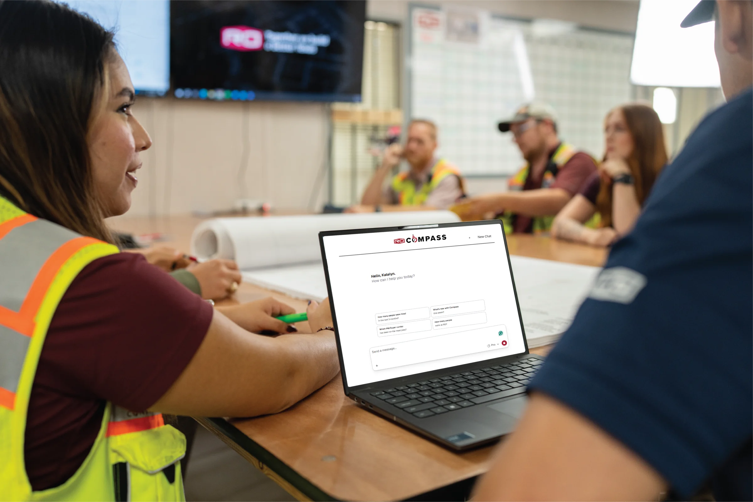 RO team members using Compass on a desktop computer