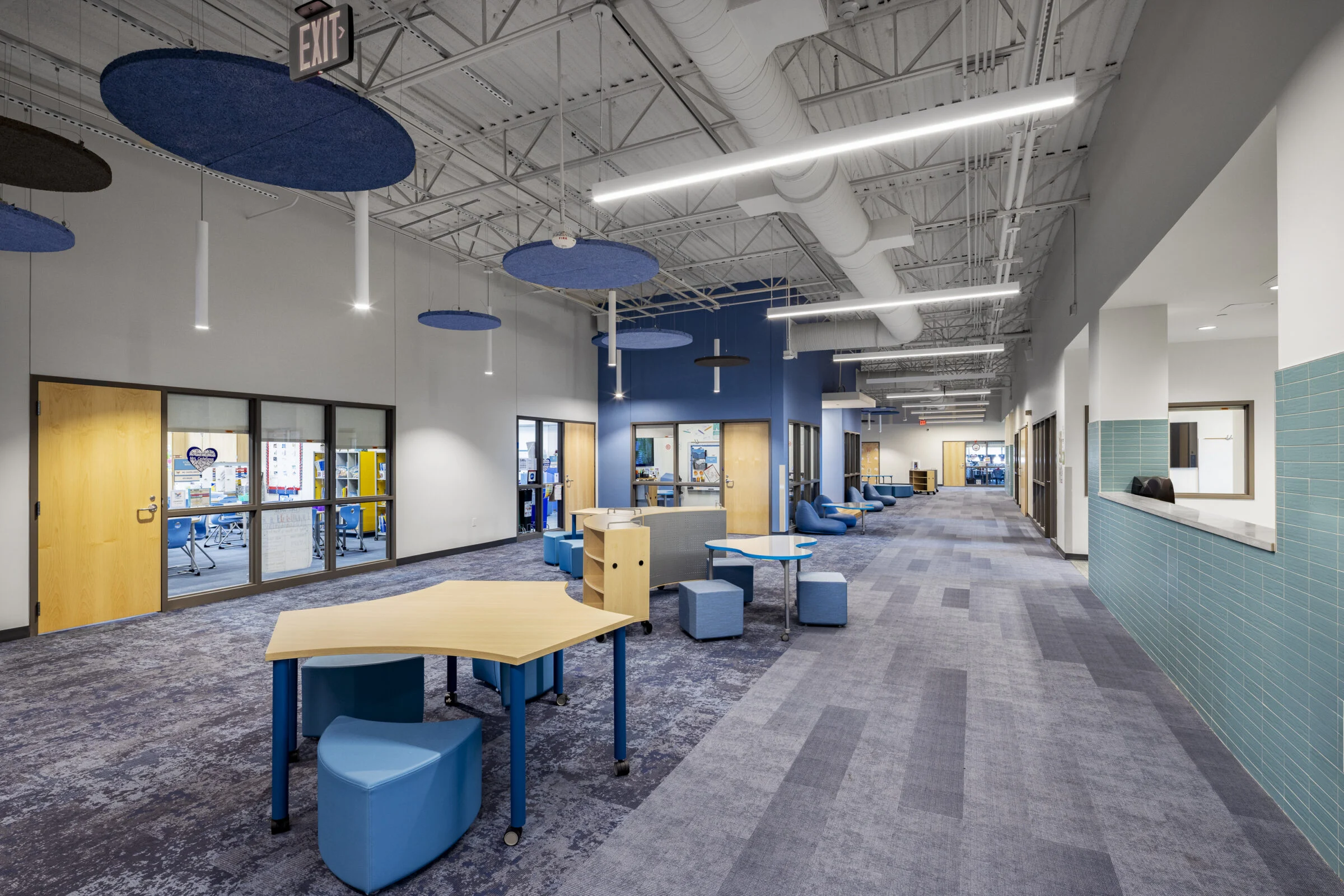 Hallway and flexible teaching space inside AISD Houston Elementary