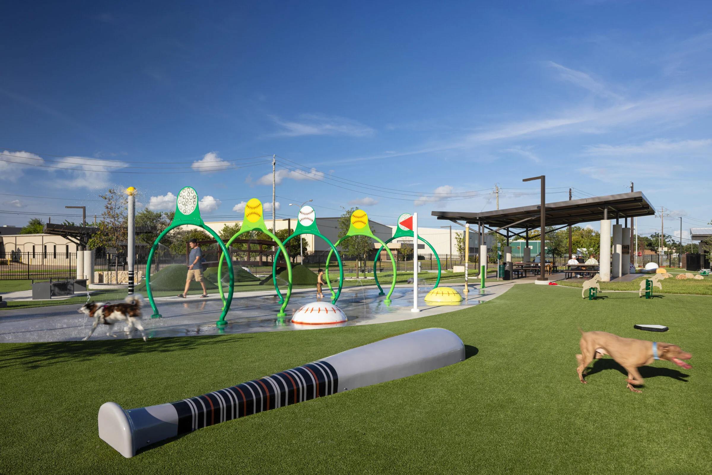Sports themed dog park with splash pads.