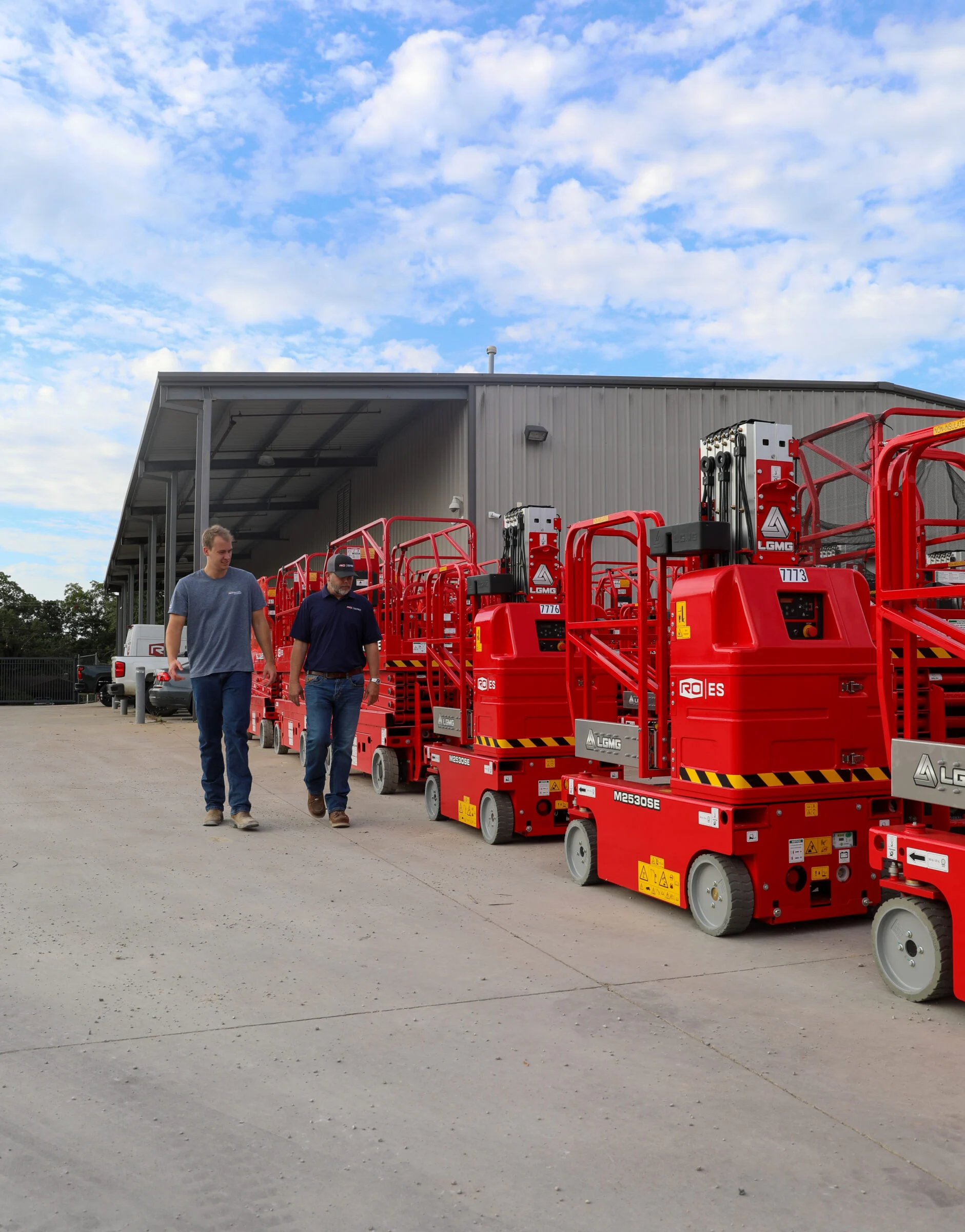 RO Equipment team members inspect lift equipment